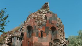 Old Red Ancient Monastry Ruin. A great piece of stock footage filmed in 4k definition, perfect for film, tv, documentaries, reality TV, trailers, infomercials and more!