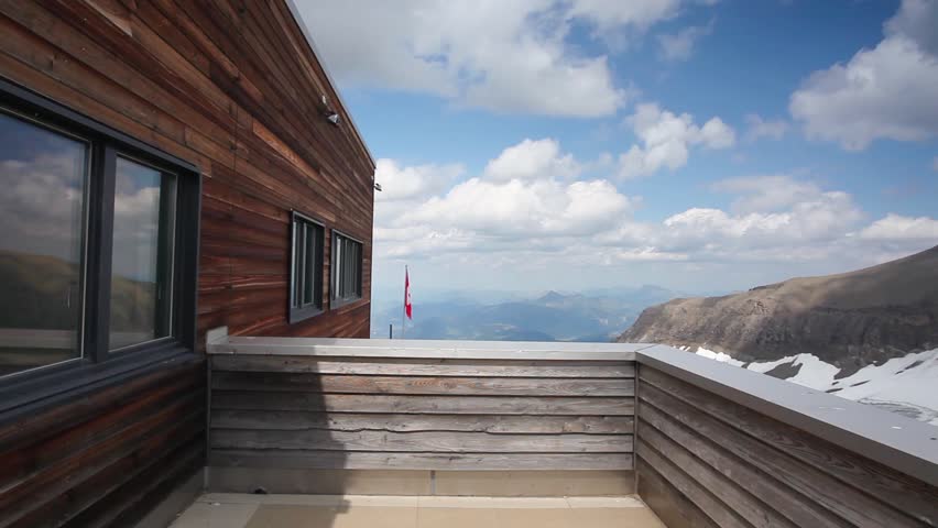 The high mountain near the Peak Walk bridge.Peak Walk is a pedestrian suspension bridge linking two mountain peaks in the Swiss Alps