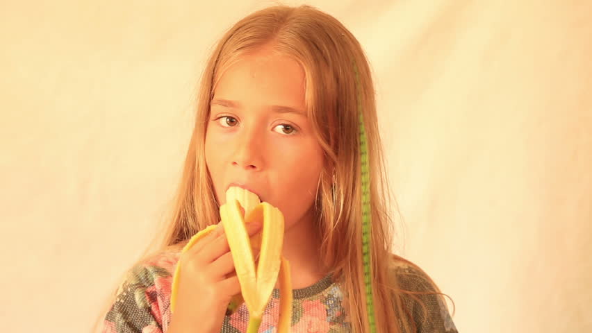 Cute Girl Eating Banana Stock Footage Video 100 Royalty Free 11321498 Shutterstock 0038