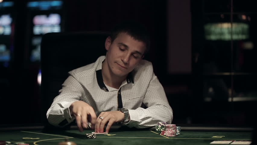 Casino, Poker: Man Playing Poker, : วิดีโอสต็อก (ปลอดค่าลิขสิทธิ์ 100%)  11329778 | Shutterstock