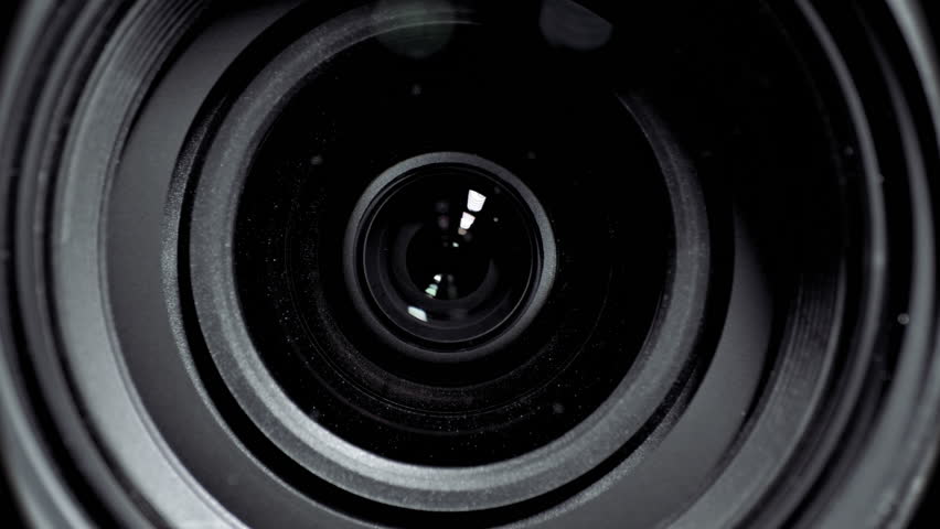 Camera lens zoom. Changing focal length. Front view macro shot. Royalty-Free Stock Footage #11333759