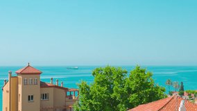 Establishing shot of typical spanish apartment building and sea view, Tarragona 4k Spain