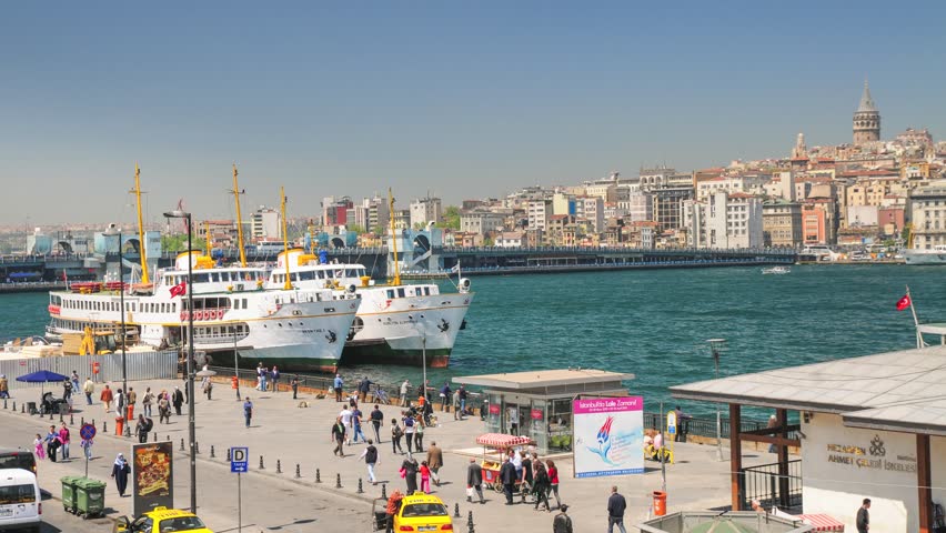 4K timelapse of Eminonu dock with Galata bridge and ferries, Istanbul