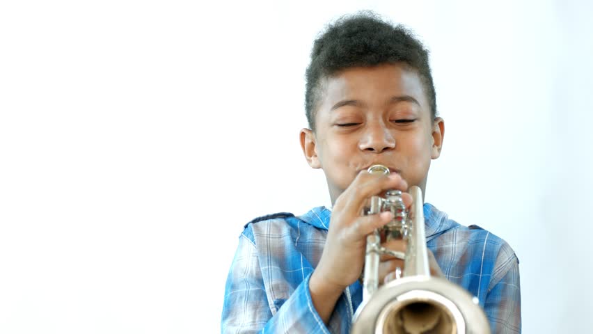 child playing trumpet