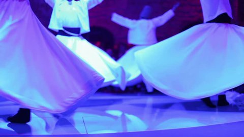 footage shot during a sema ceremony, of sufi dervish dancers