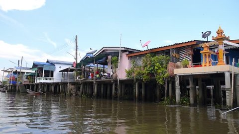 Asian Slum Houses On The River in Thailand. Surat Thani, Thailand. HD, 1920x1080. 