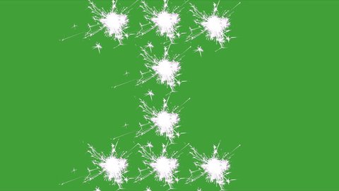 Capital letter I spelled with white sparklers on green screen.