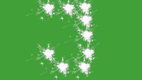 Capital letter J spelled with white sparklers on green screen.