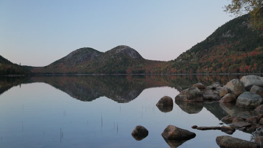 Locked down view of Jordan Pond and North and South Bubble at dusk, Acadia National Park, in Autumn.
