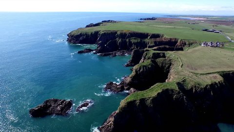 Aerial shot of sea cliffs off the coast of Scotland near Aberdeen