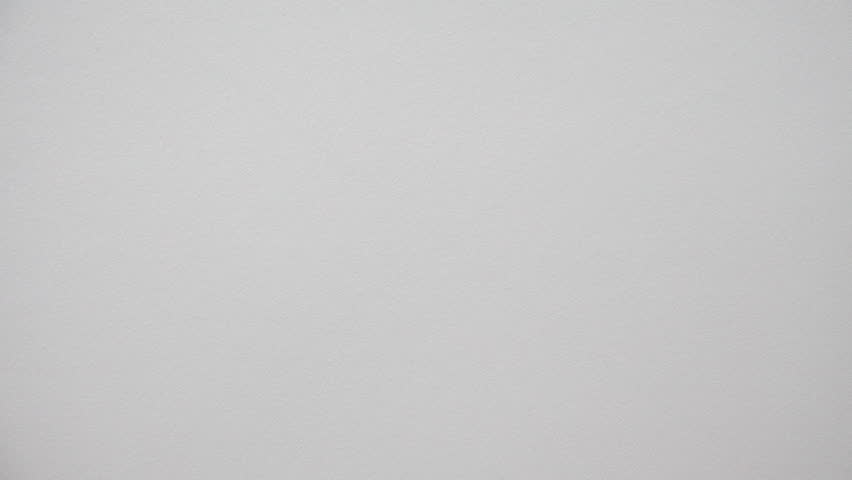 Human hand drawing a lot of stars with orange gouache/the stars appeared accelerated
