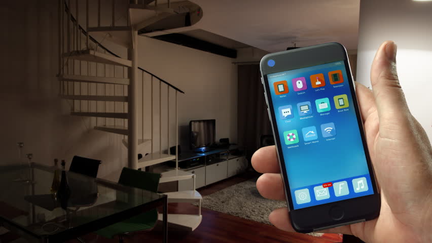 Smart Home - smart house, home automation, device with app icons. Man uses his smart phone with smarthome security app to turn on the lights of his house. (Shot on RED) Royalty-Free Stock Footage #11405453