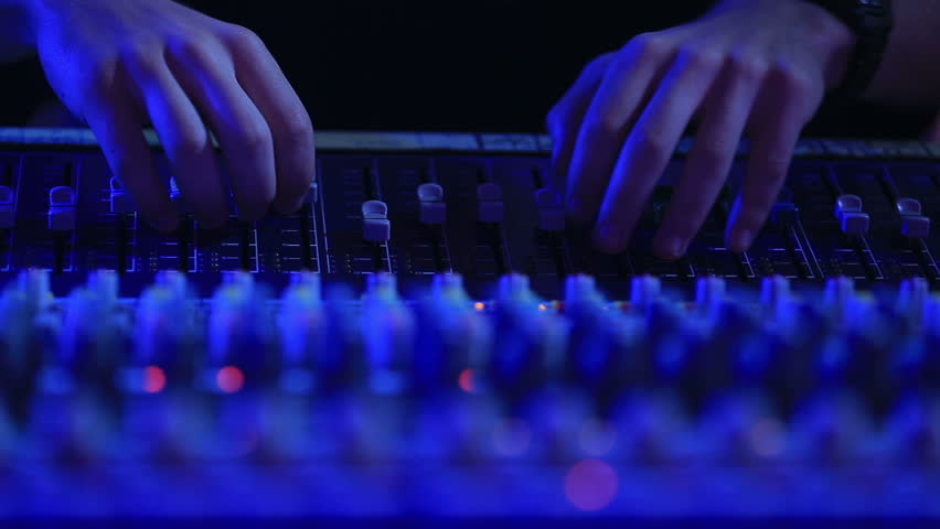 Soundboard,k5. DJ on work Table.