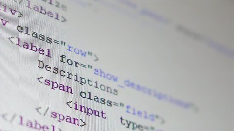 Program code running down on computer screen

