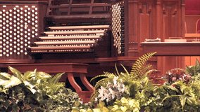 Video of Mormon historic Tabernacle and pipe organ Temple Square in Salt Lake City Utah. Church of Jesus Christ of Latter-Day Saints, Mormon. Pipe organ and pulpit. LDS Church. Zoom out from organ. 