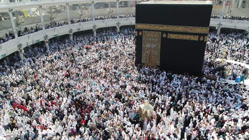 MECCA SAUDI ARABIA FEBRUARY 2 2015: Muslim pilgrims from all around the World revolving around the Kaaba on February 2, 2015 in Mecca Saudi Arabia. Muslim people praying together at holy place. | Shutterstock HD Video #11484290