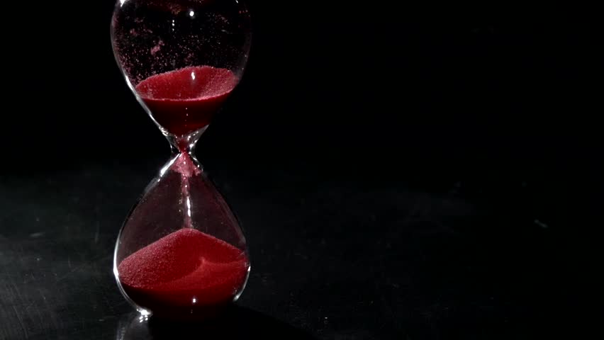 Hourglass Red Sand On Black Background Stock Footage Video 100