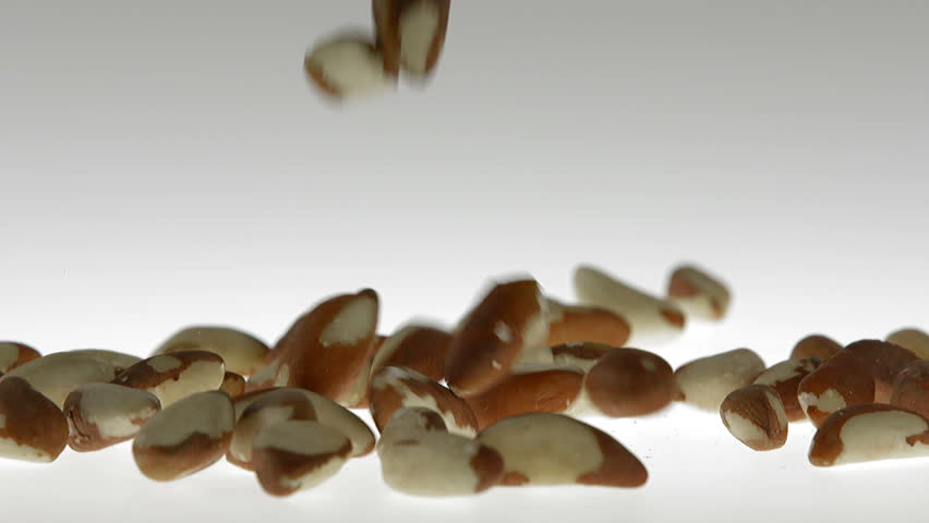 180fps Super Slow Motion Brezil Nuts Falling on White Surface