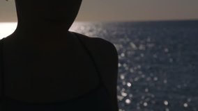 Young girl twirling fitness hula hoop around waist on the beach closeup - Powered by Shutterstock - Get 15% off with code: PIKWIZARD15