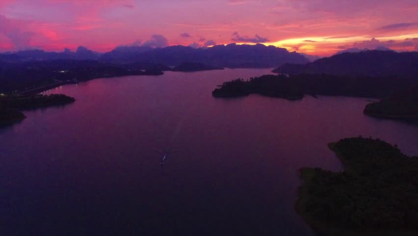 vivid purple lake sunset, aerial shot