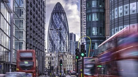 LONDON, UK - JULY 14: Timelapse view of a busy crossroad in the hearth of the financial district of the City of London, near Liverpool street train station, London, UK. July 14, 2015