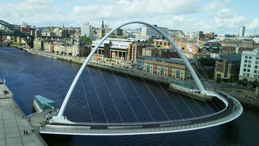 Newcastle, England - August 28, 2015: Timelapse of the Gateshead Millennium Bridge, a footbridge over the river Tyne between Newcastle and Gateshead, demonstrating its action when opening and closing. Royalty-Free Stock Footage #11500454