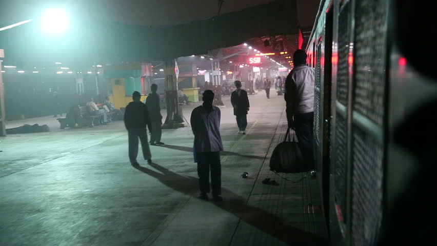 AMRITSAR, INDIA - 2 MARCH 2015: View on train station from arriving train in night time in Amritsar. | Shutterstock HD Video #11502902