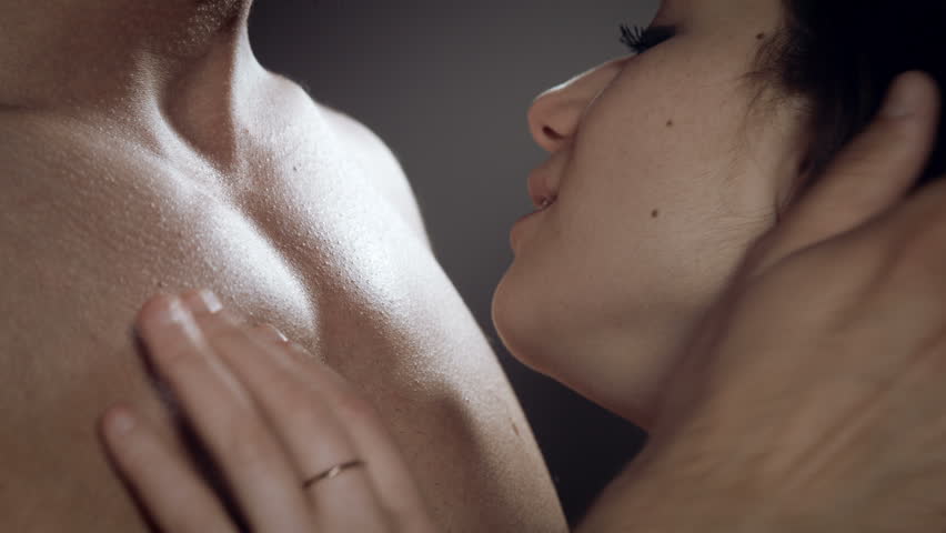 man caressing hair his woman kisses: стоковое видео (без лиц