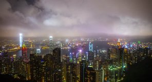 A time lapse video of the Hong Kong skyline taken in the Peak with moving clouds over the cityscape