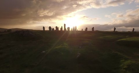 Cinematic aerial shot of Callanish standing stones on the Isle of Lewis, Outer Hebrides, Scotland