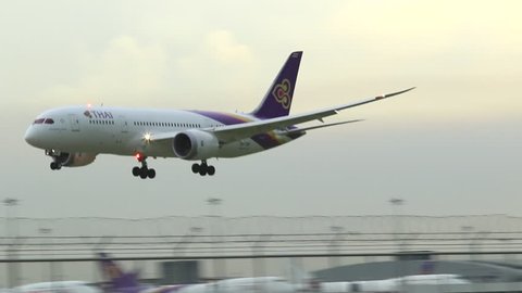 BANGKOK, 15 AUGUST 2015, Plane landing and takeoff on runway at Suvarnabhumi International Airport in Bangkok of Thailand 