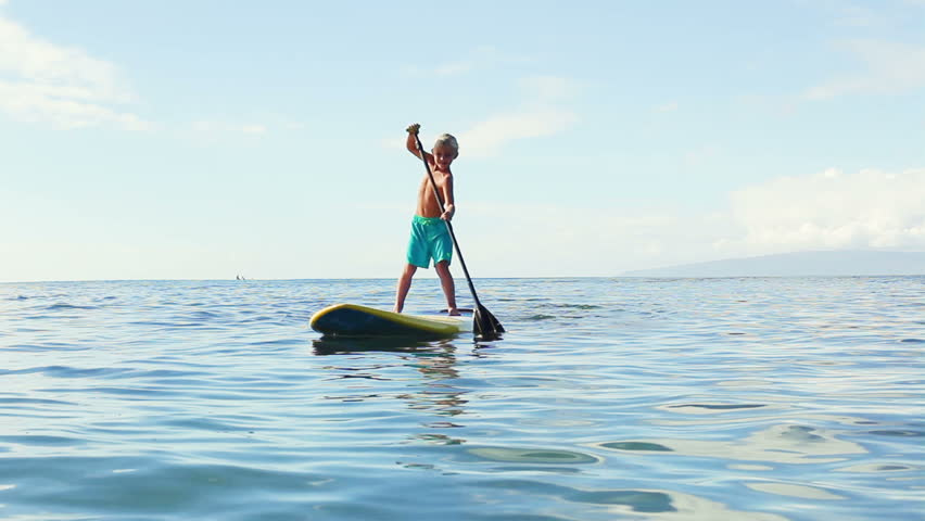 Young Blonde Surfer Boy Stand Up Paddling. Summer Fun Family Vacation.