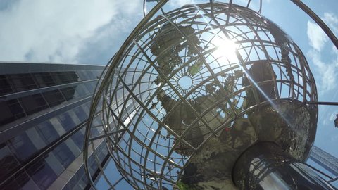 New York City, USA - 13 May 2015: Low angle view of the Globe sculpture at Columbus Circle in Midtown Manhattan.