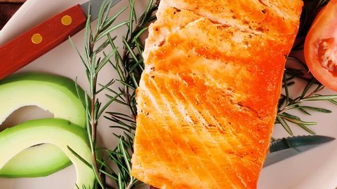 food: grilled salmon on big glass plate on wooden table 1920x1080 intro motion slow hidef hd