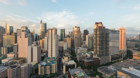 Manila, Philippines - Sept 2, 2015: Metro Manila Day to Night timelapse. Elevated, night view of Makati, one of the most developed business district of Metro Manila. 