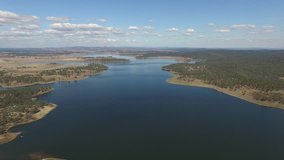 Aerial view stock video footage view  joh Bjelke-Petersen freshwater Dam in regional queensland australia. Drinking water reservoir also popular for fishing, boating and tourism holiday area. BP Dam
