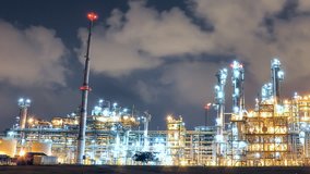 Lighting from Refinery plant with blue night sky , Time lapse video