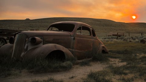 Abandoned Car in Ghost Town with Fiery Sunset Sunrise Timelapse 
