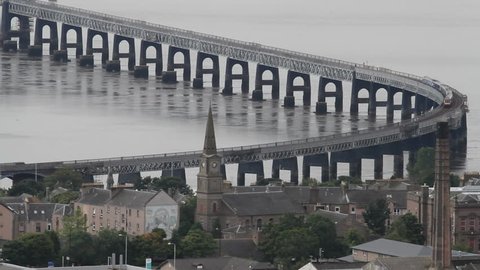 Elevated view of Train crossing Tay Rail Bridge Dundee Scotland
