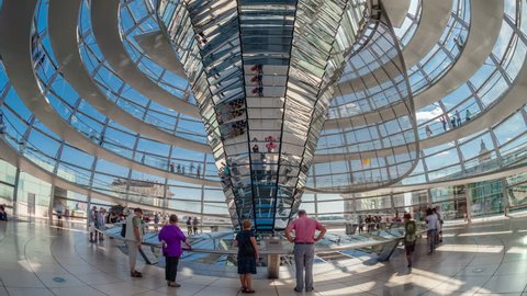 BERLIN - JULY 7, 2013: Tourists  move inside the Cupola of the Reichstag building on July 7, 2013 in Berlin, Germany. Timelapse view 4K.