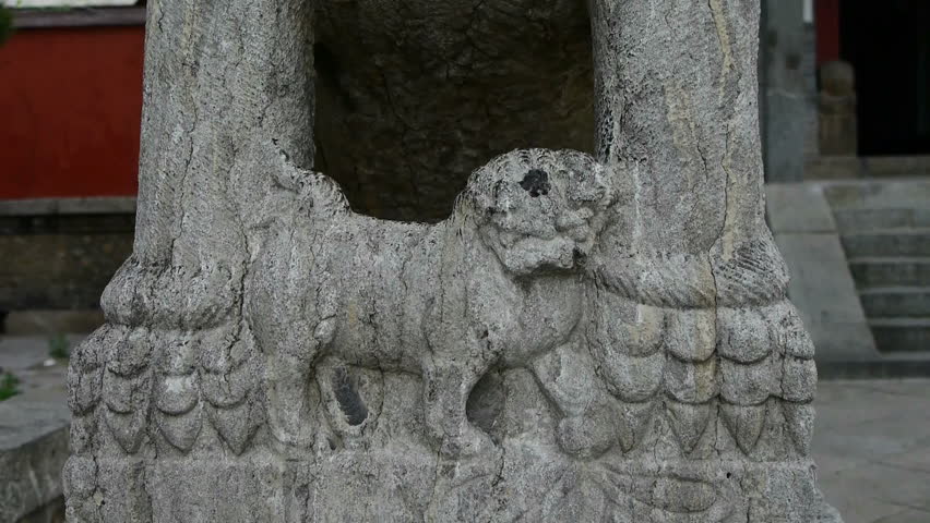 stone lions at temple entrance,historical monuments,shaking tree shadows. gh2_02243