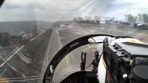 POV fighter jet takeoff. FA-18 takeoff from aircraft carrier. POV with natural audio.