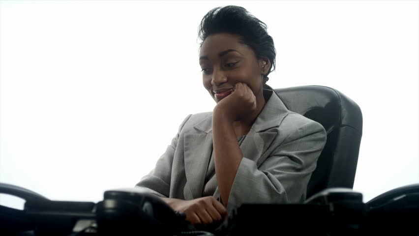 An African woman stressed in a callcenter 