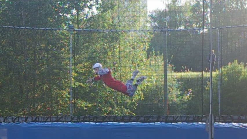 A person showing acrobatic on Aerodium, a vertical wind tunnel in Latvia.