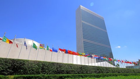 NEW YORK CITY - JUNE: United nations headquarters, view on the building and flags of the members countries, NYC day June 2015