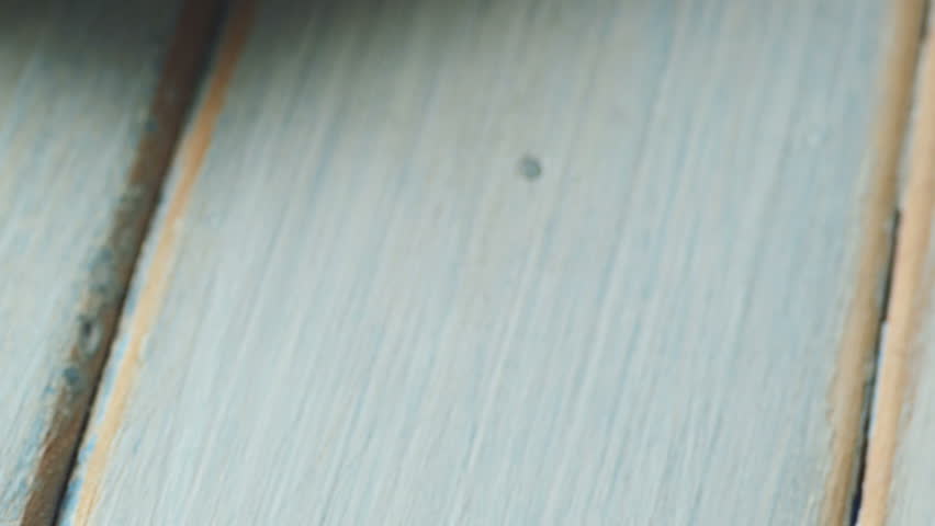 4K: US Currency Sticking Out Of A Wallet Spinning Into Frame

