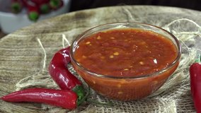 Sambal Oelek chili sauce (not loopable 4K UHD footage)