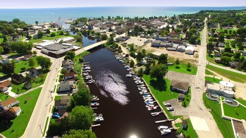 Scenic Tourism and Sport Fishing Destination, Algoma Wisconsin, Ahnapee River, Docks, bridges, harbor, Lake Michigan; Aerial View.