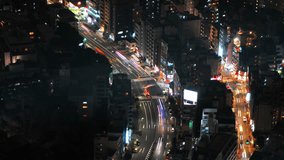 Aerial time-lapse shot of Tokyo's busy city roads
