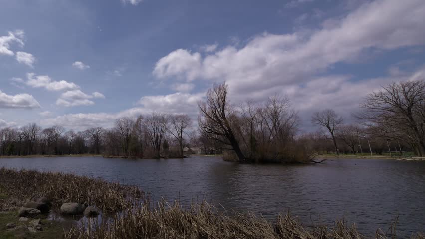 Created from 16 megapixel still images, this timelapse shows wild cloud activity as well as wildlife in the pond.  The image pans from right to left as the timelapse occurs.